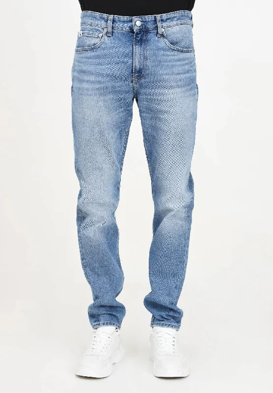 Jeans Slim Tapered in denim chiaro da uomo